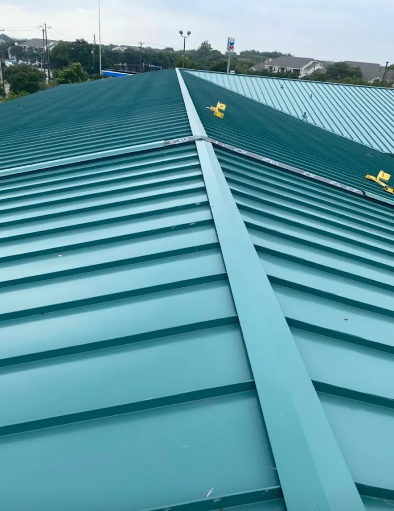 Green commercial metal roof ridge and valley for Metal Roof Repair in River Edge